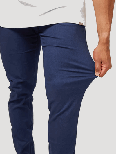 VertoFlex™ – męskie spodnie typu slim fit z elastycznym wykończeniem