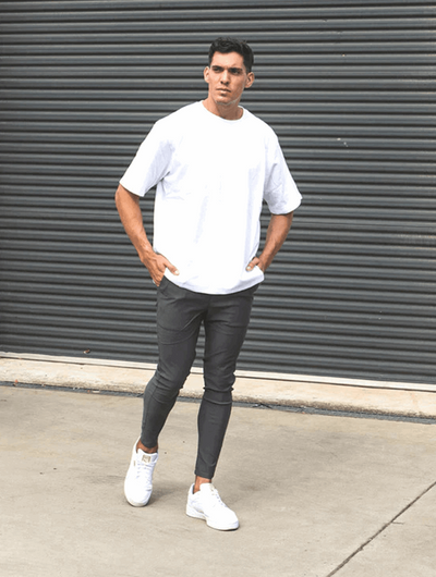 VertoFlex™ – męskie spodnie typu slim fit z elastycznym wykończeniem