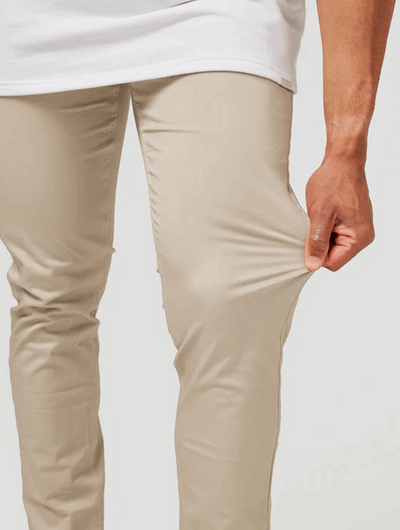 VertoFlex™ – męskie spodnie typu slim fit z elastycznym wykończeniem